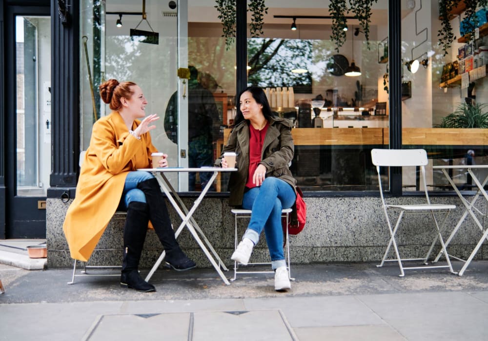 Residents relaxing at a coffee shop near Haven Poway in Poway, California