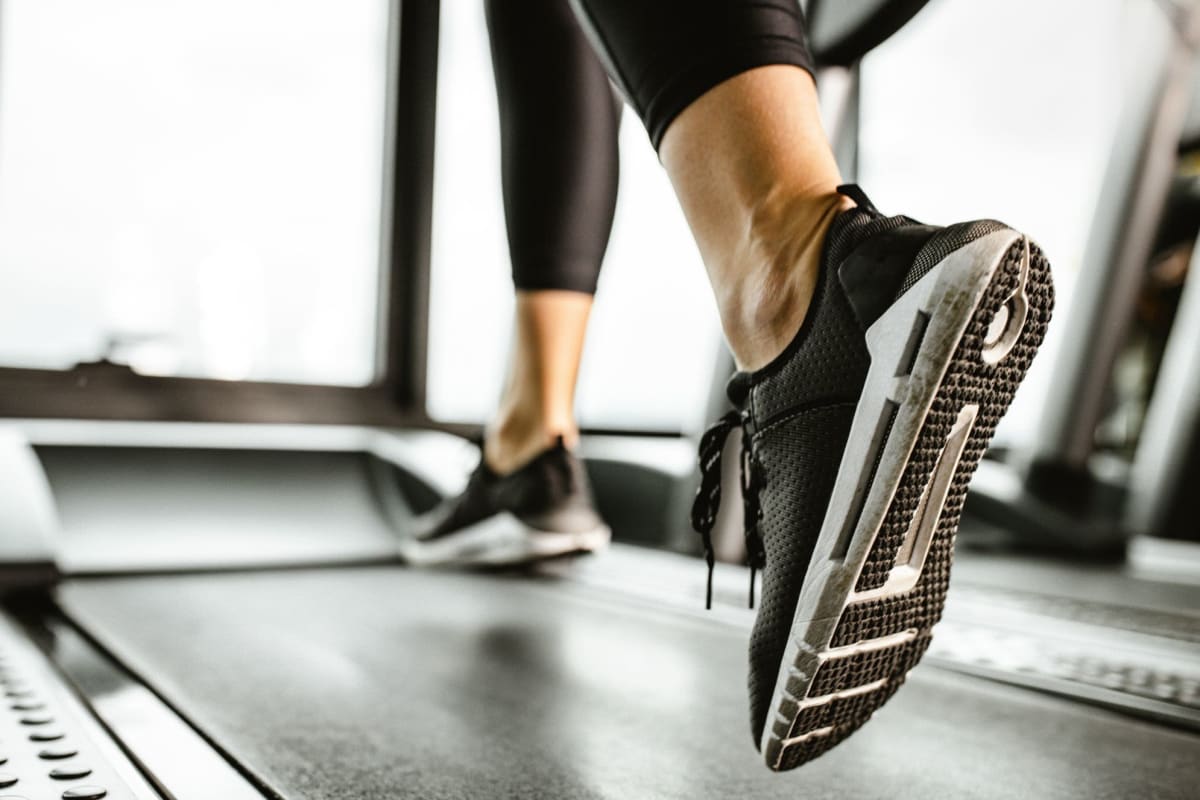 A resident runs on treadmill in fitness center at Playa Pacifica, Playa Del Rey, California