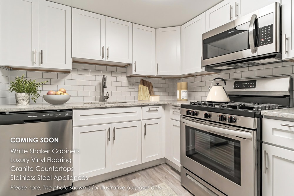Fully equipped kitchen with stainless-steel appliances and quartz countertops coming soon to Riverbend at Wappingers Falls in Wappingers Falls, New York