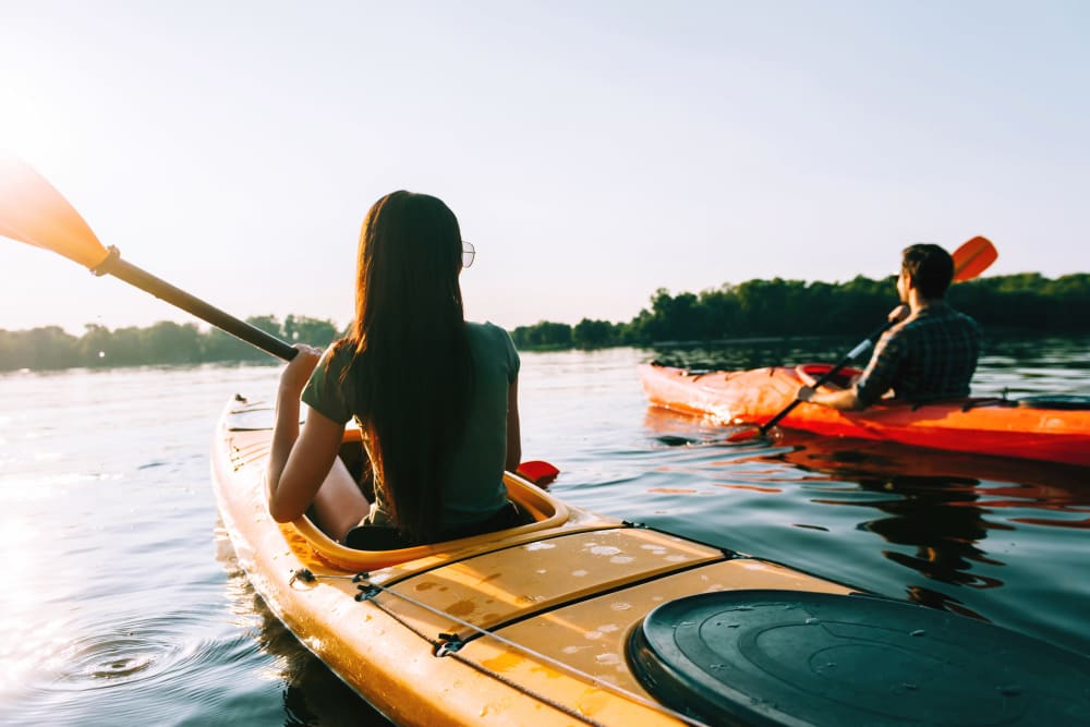 Residents kayaking on the lake at Emma Jean Hull Flats in Benton Harbor, Michigan