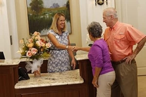 Concierge providing their services to senior citizens at Discovery Commons At Wildewood in California, Maryland.
