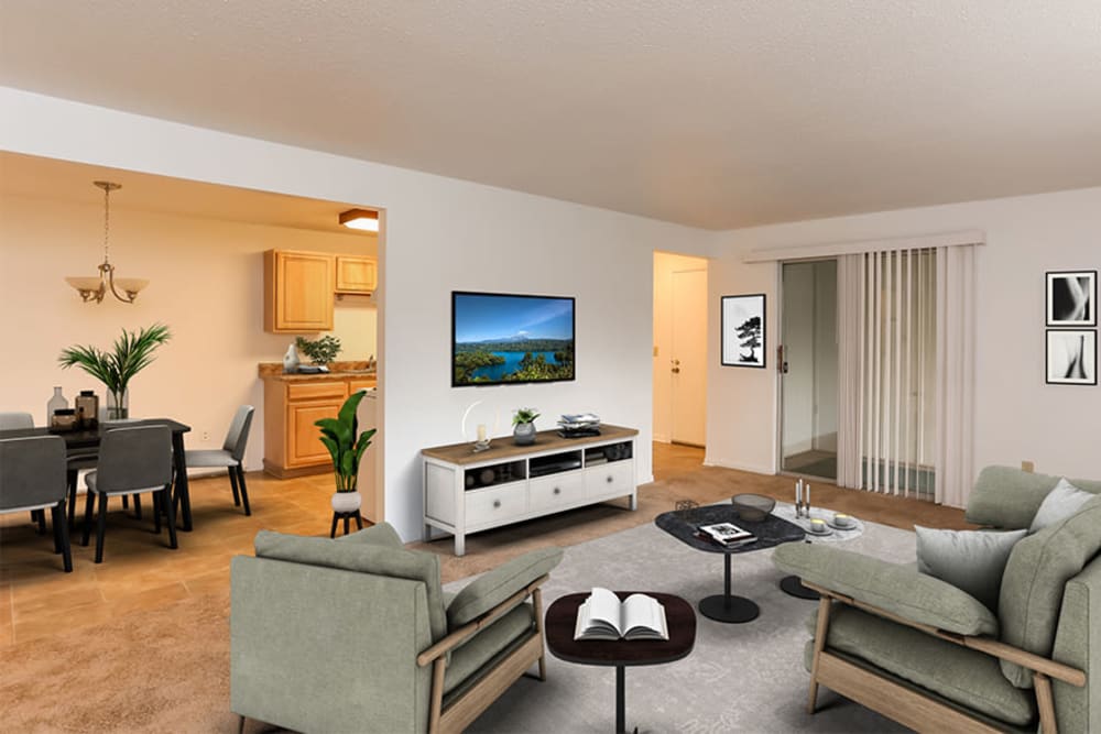 Spacious model living room and dining room at Henrietta Highlands in Henrietta, New York