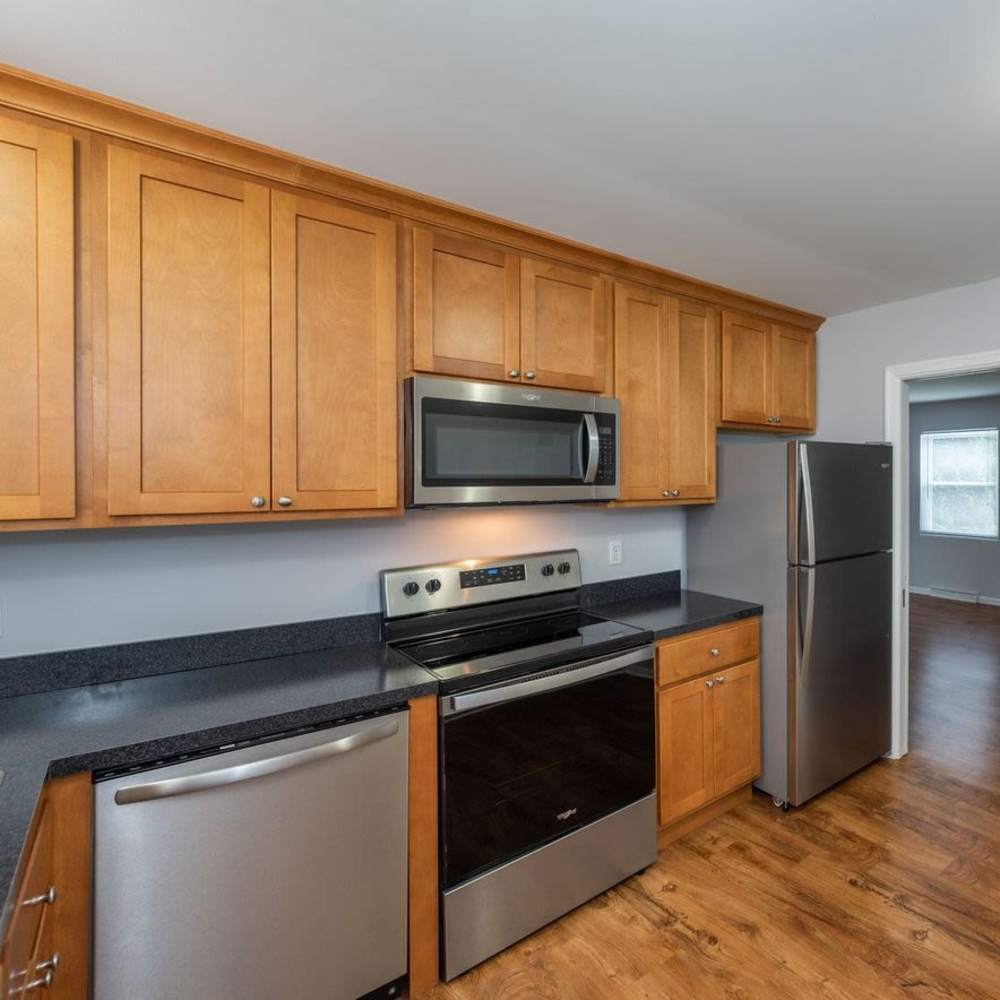 Kitchen with stainless-steel appliances at Signal Point Apartments in Mechanicsville, Virginia