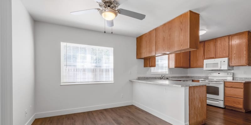 Kitchen and dining room view at Olympic Grove in Joint Base Lewis McChord, Washington