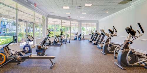 Fitness center with cycling machine at MainGate Village in Kissimmee, Florida