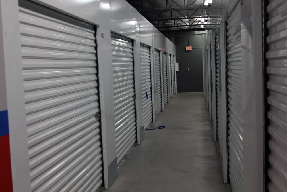 Hallway of indoor units at Trojan Storage of Oxnard in Oxnard, California