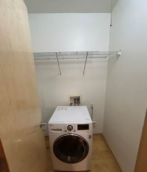 Laundry room with washer at 311 Kenwood Parkway in Minneapolis, Minnesota 