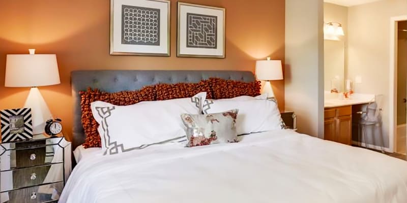 Model bedroom and attached bathroom at Fox Run Apartments in Edgewood, Maryland