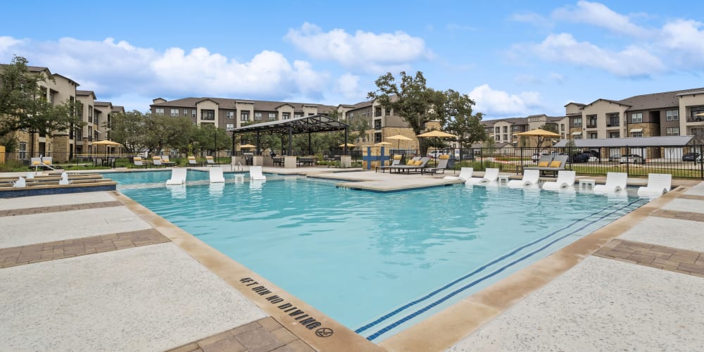 The resort-style swimming pool at Radius Wolf Ranch in Georgetown, Texas