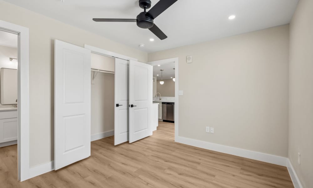 Bedroom with a closet area at Lake Meadows in Garland, Texas