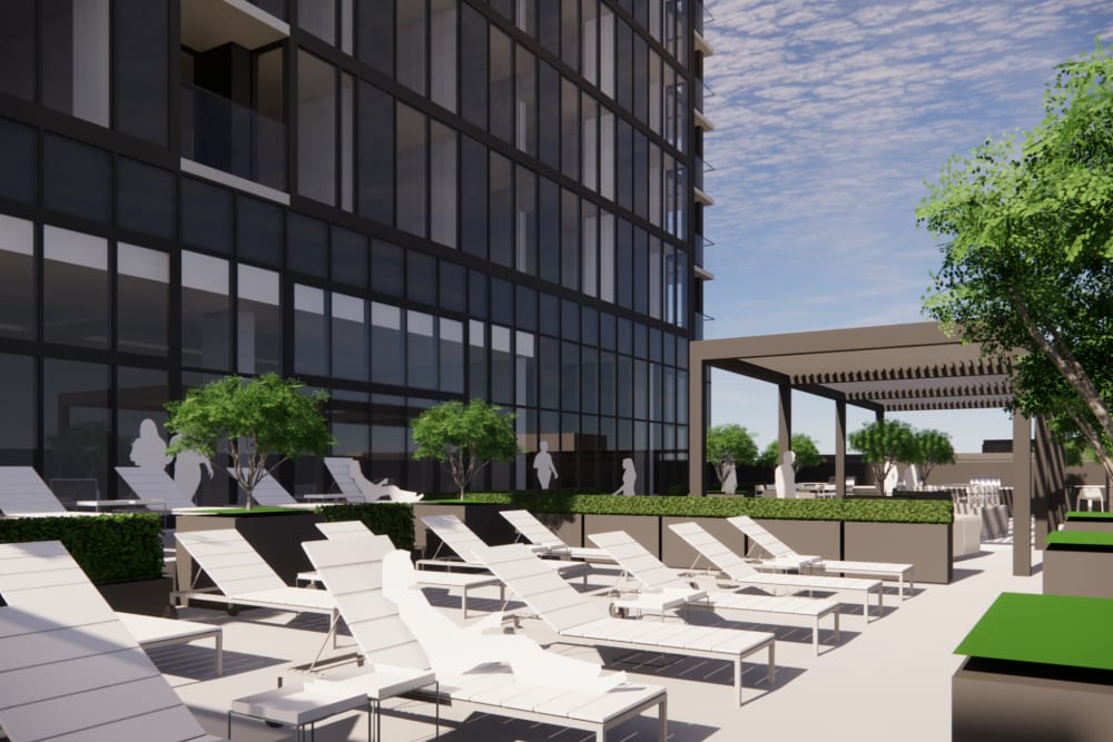 Rendering of residents lounging area by the swimming pool at Studio Park Lofts & Tower in Grand Rapids, Michigan