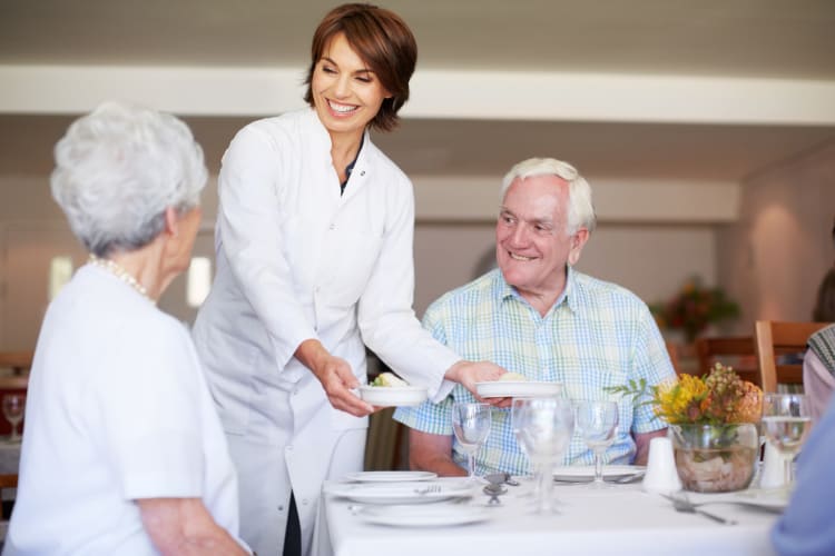 Elderly couple having dinner at Traditions of Cross Keys