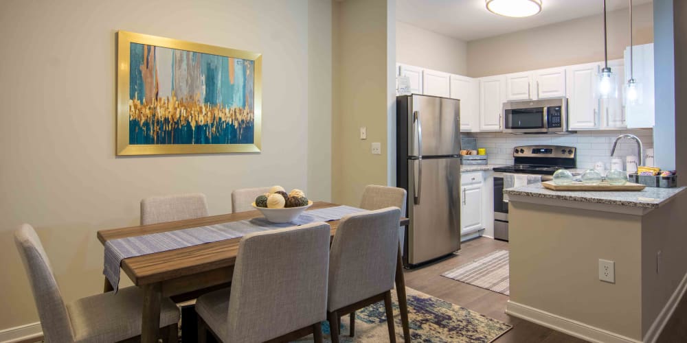 An apartment living room with a fireplace at River Forest in Chester, Virginia