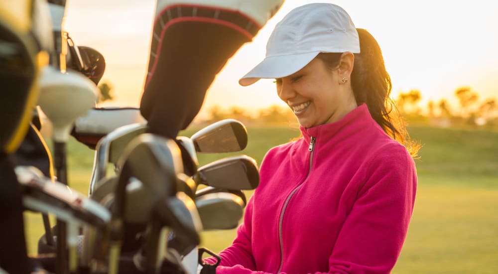 A resident plays golf near Luxia Craig Ranch in Mckinney, Texas