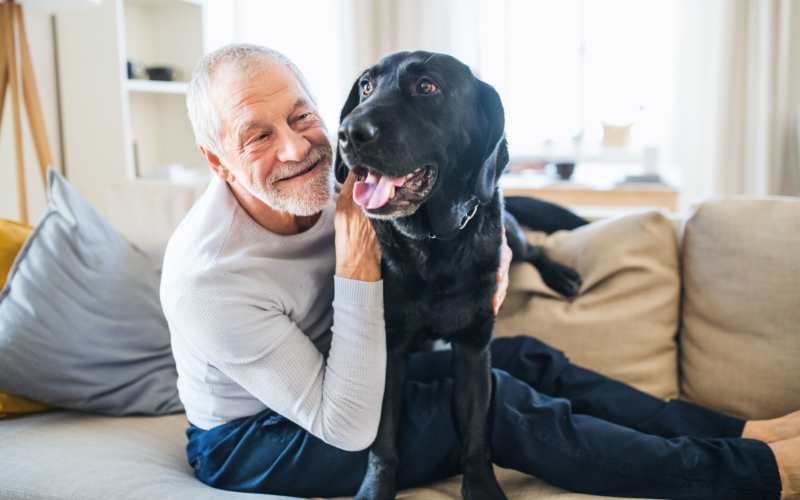 Resident with his dog at Lighthouse Pointe in Chesapeake, Virginia