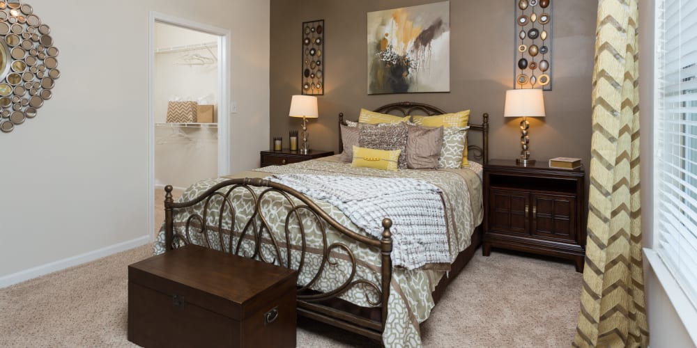 Model bedroom with attached bathroom at City Harbor in Melbourne, Florida