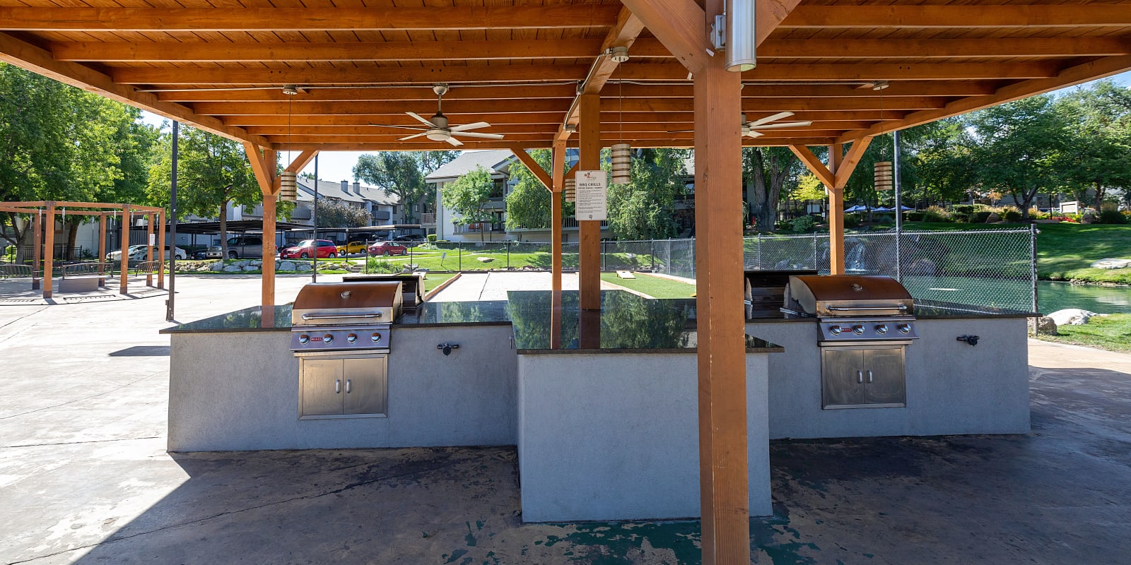 Outdoor grill area at Springs of Country Woods Apartments in Midvale, Utah