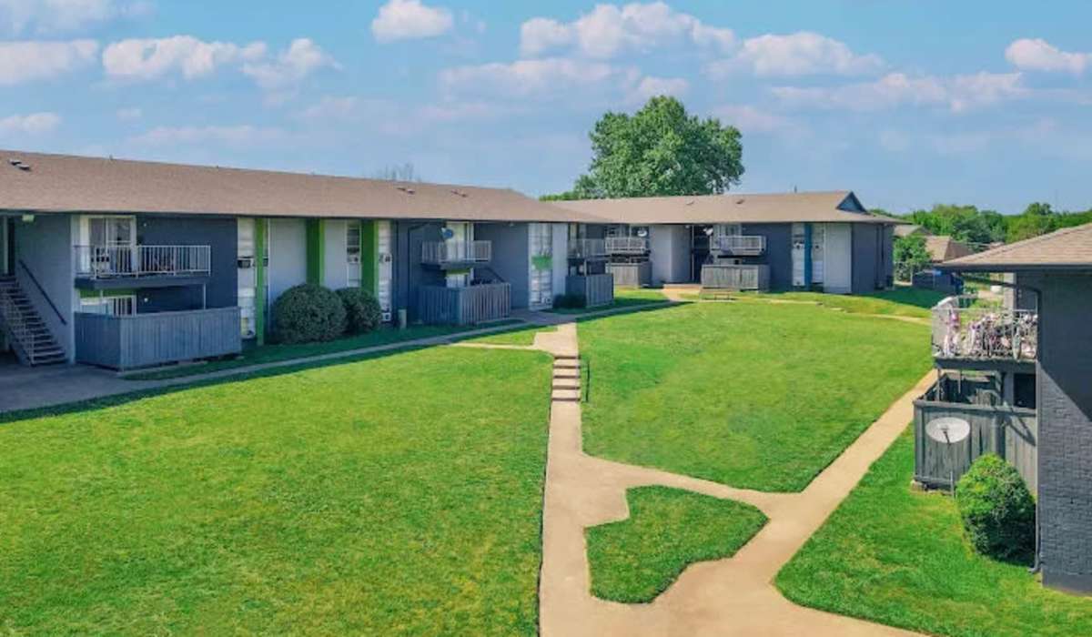 Exterior view of community with green lawn at 2704 CDMX in Dallas, Texas