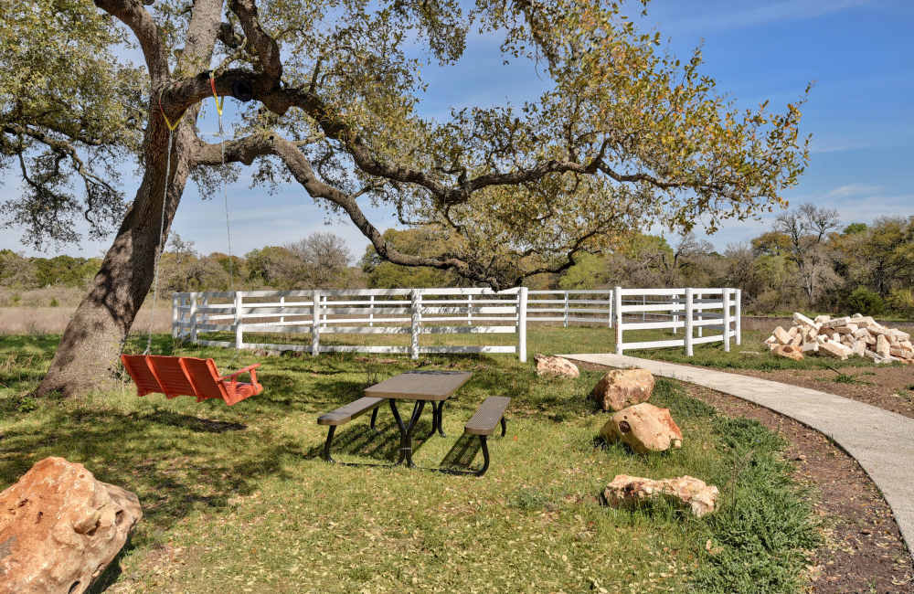 Backyard at Homestead Oaks Apartments in Austin,Texas
