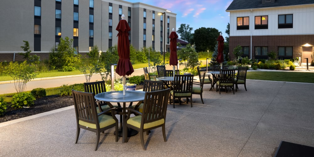 Evening view of the surrounding area from an outdoor dining area at Anthology of Mason in Mason, Ohio