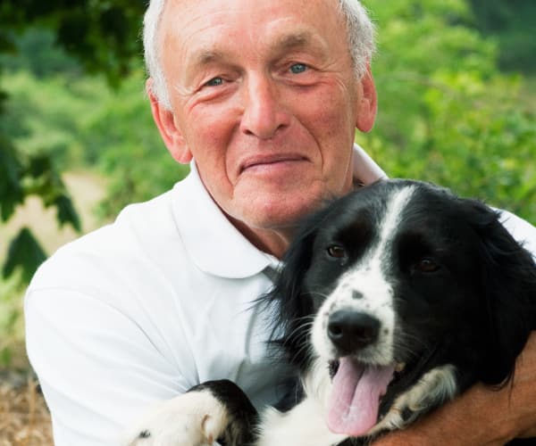 Resident enjoying time with his dog in Greenacres, Florida