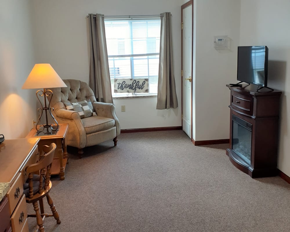 Comfortable living room in one bedroom apartment at Clover Ridge Place in Maquoketa, Iowa.