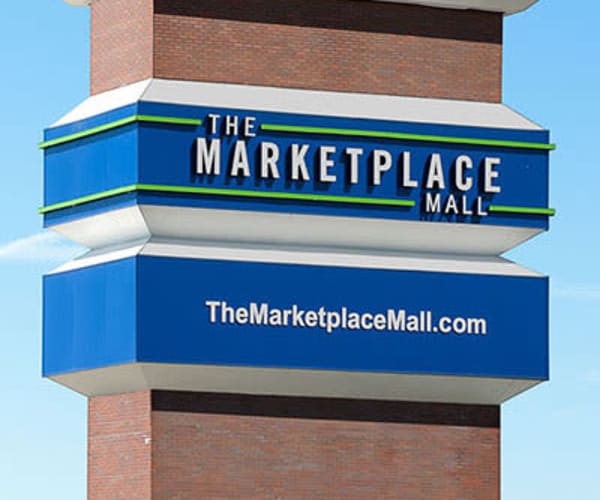 Shopping mall in West Henrietta, New York near Riverton Knolls