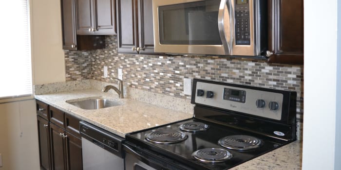 Villages at Montpelier Apartment Homes offers a kitchen in Laurel, MD