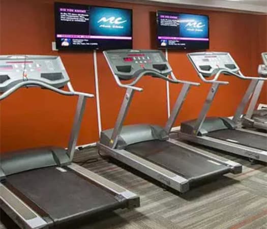 Fully equipped fitness center at Solon Club Apartments in Oakwood Village, Ohio