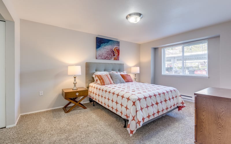 Spacious master bedroom with plush carpeting at Cascade Ridge in Silverdale, Washington