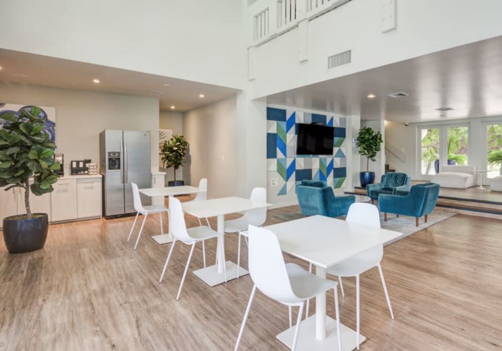 Large community room with large windows and stainless steel appliances at The Villas at Woodland Hills in Woodland Hills, California