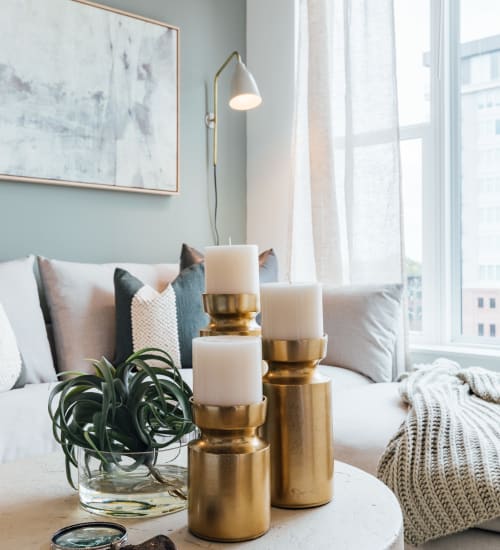 A decorated coffee table in an apartment living room at Citizen in Atlanta, Georgia