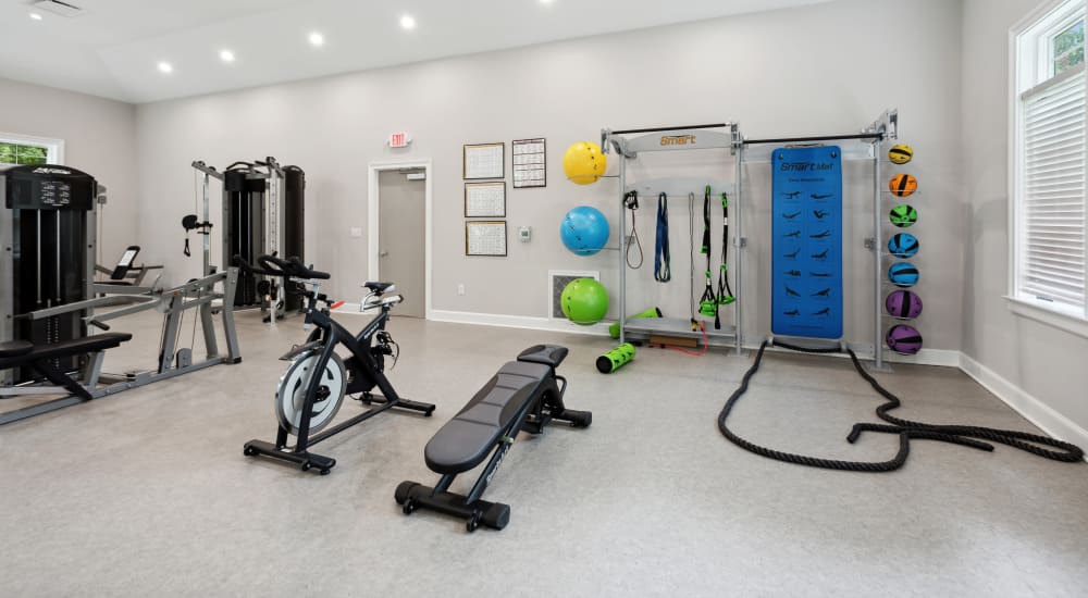 TRX and cardio equipment in the fitness center at The Villages at West Laurel in Richmond, Virginia