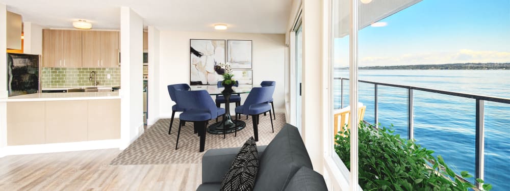 Living room with a view of the water at Lakefront on Washington in Seattle, Washington