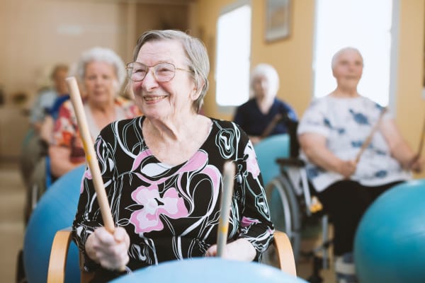 Memory care resident attending a class at Randall Residence at Gateway Park in Greenfield, Indiana