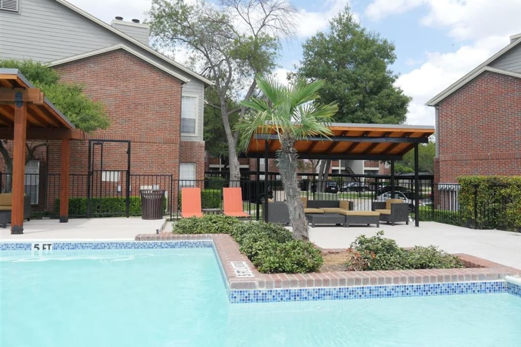 Gorgeous swimming pool area on a beautiful day at Veridian Place in Dallas, Texas