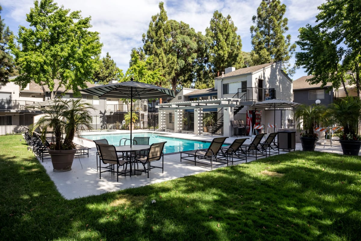 Pool surrounded by lush green lawn at Willow Creek, San Jose, California