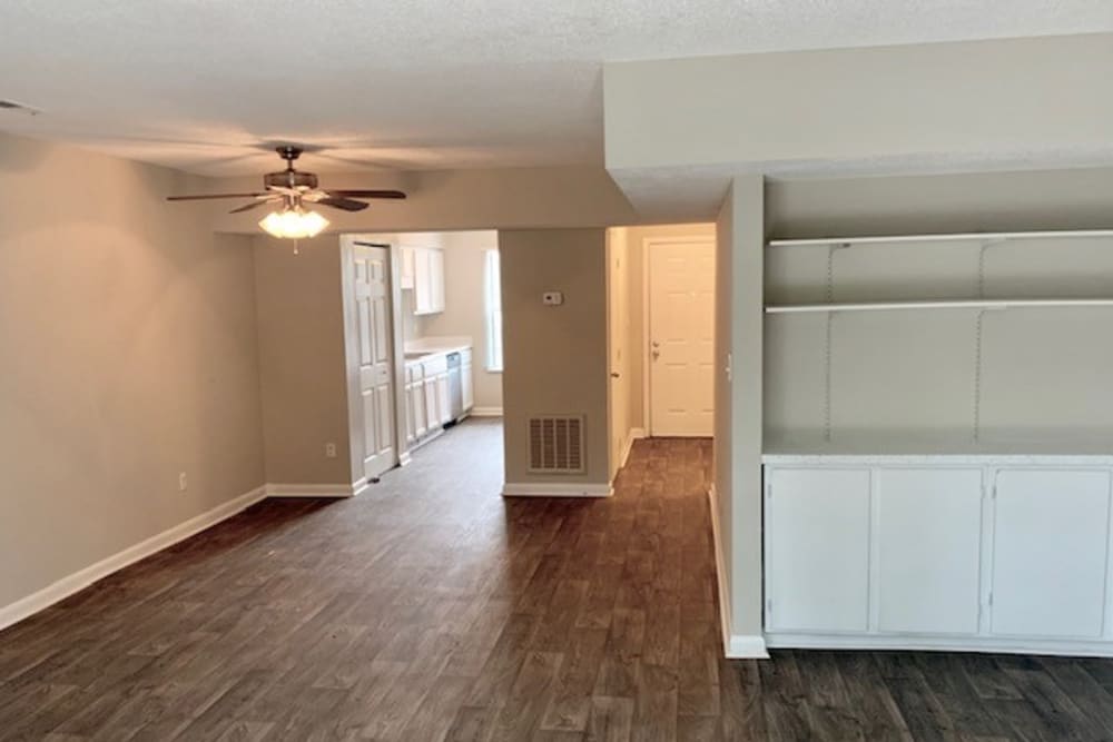 An apartment with wood-style flooring at Amber Oaks in Durham, North Carolina