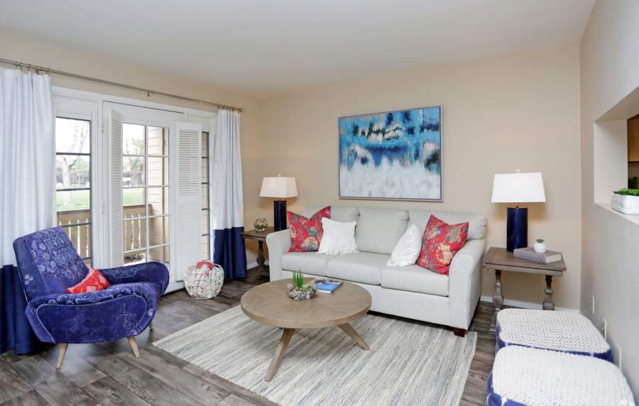 Bright and spacious living room at Wasatch Club Apartments in Midvale, Utah