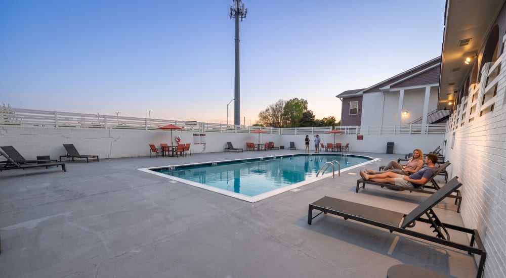 Residents enjoying the swimming pool at Equinox at Midtown in Chattanooga, Tennessee