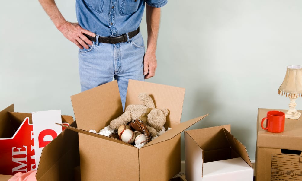 Man packing boxes at Aarons Self Storage in Texas