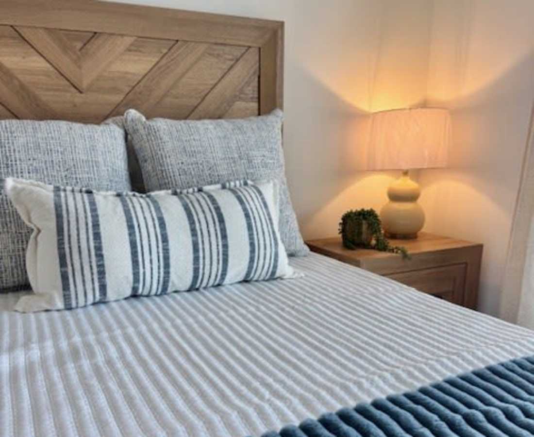 Wooden headboard with chevron pattern at Pritchard Park Place in Racine, Wisconsin