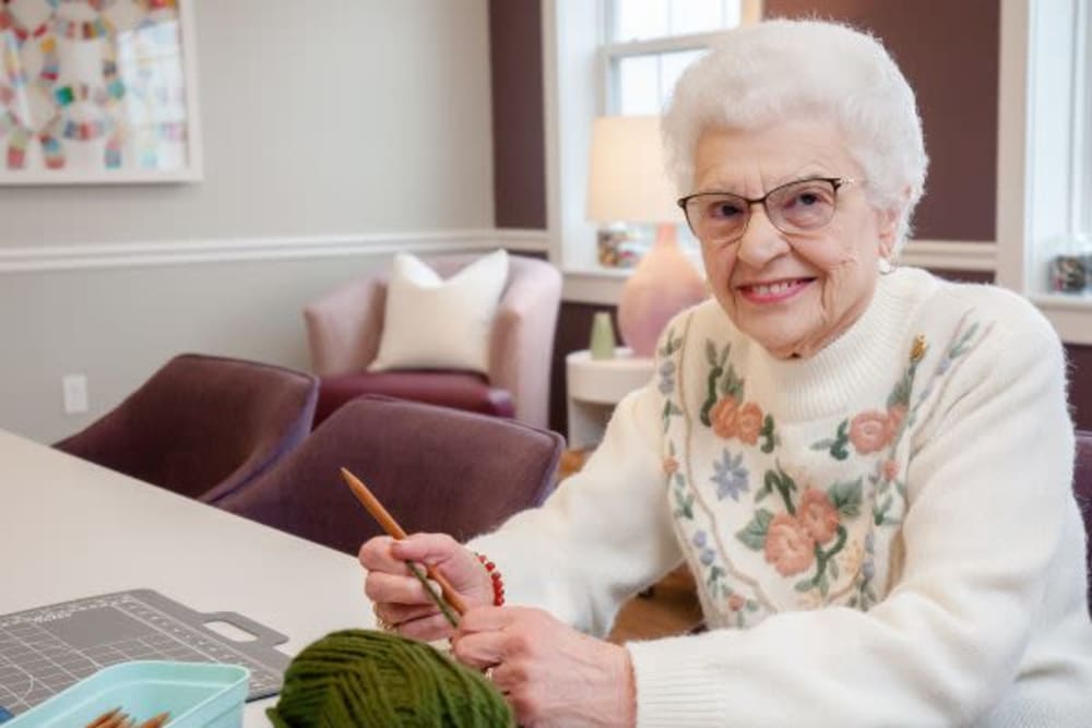 Resident knitting at The Pinnacle in Plymouth Meeting, Pennsylvania