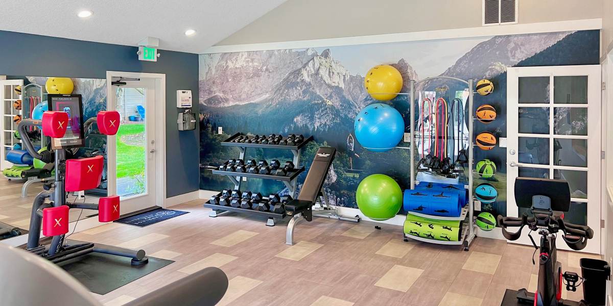 Fitness center with plenty of individual workout stations at Carriage Park Apartments in Vancouver, Washington