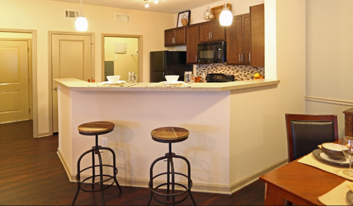 Upgraded kitchen with bar seating at Lullwater at Riverwood in Evans, Georgia