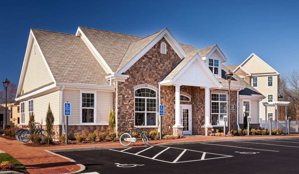 Leasing office exterior with parking spots at Alterra | Rocky Hill in Rocky Hill, Connecticut