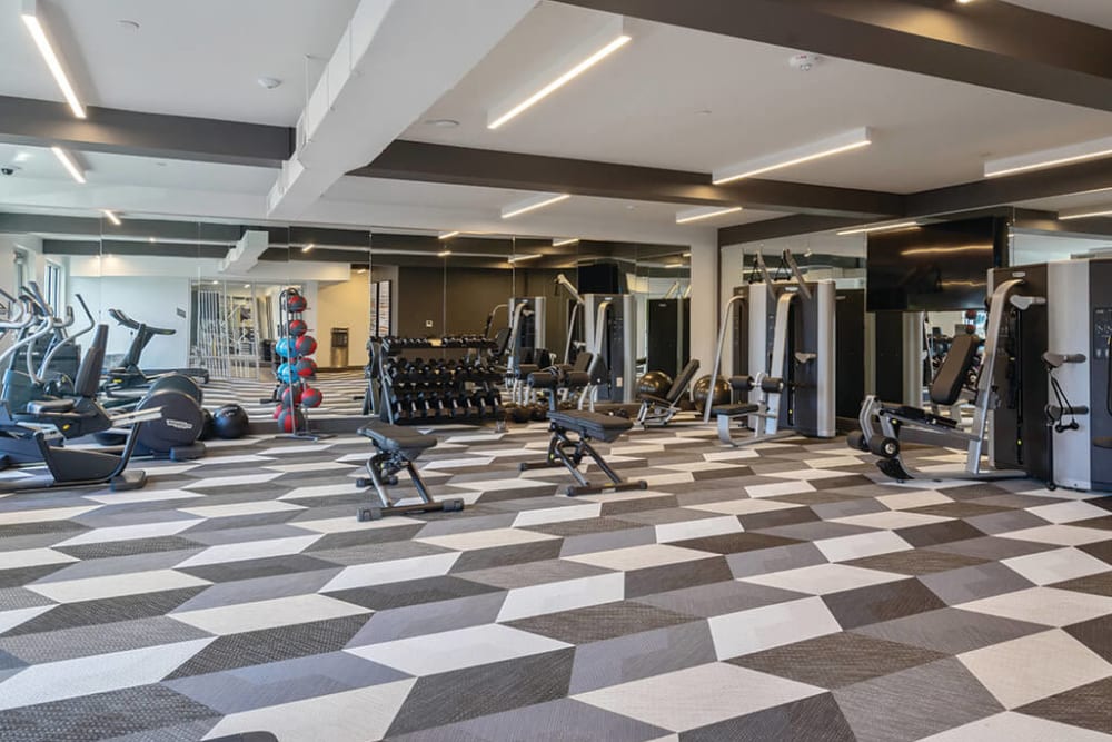 Well-equipped onsite fitness center at ArLo Apartments in Portland, Oregon