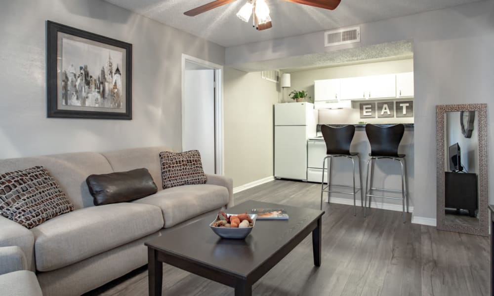 Living room and kitchen at Willowick Apartments in College Station, Texas