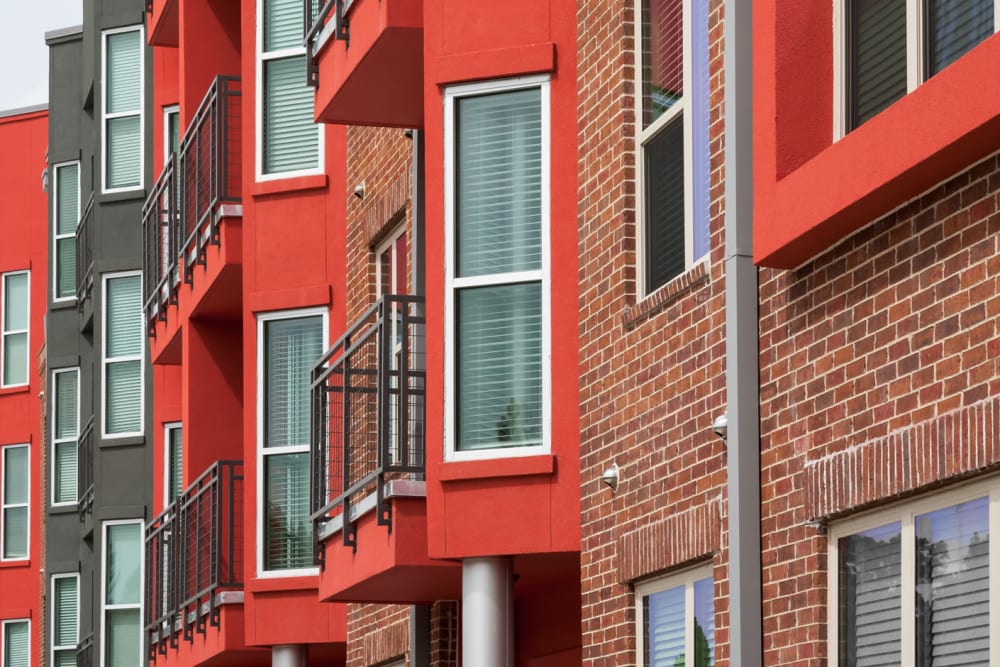 Exterior with various balconies at Anatole at the Pines in Conroe, Texas