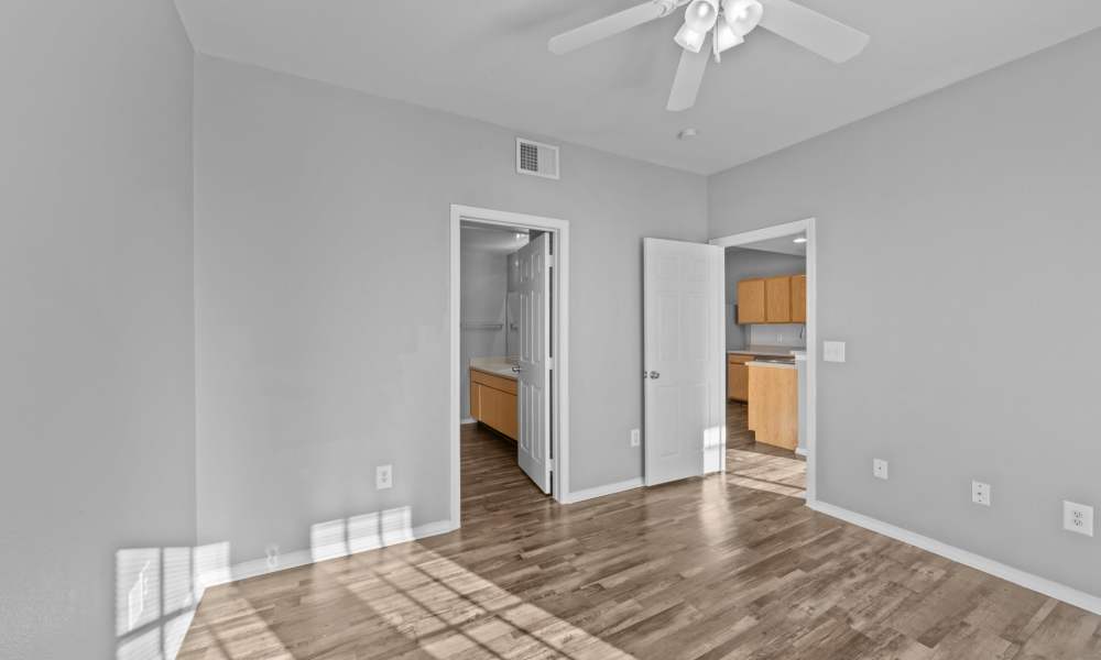 Unfurnished bedroom with connecting rooms at Burkburnett Residences in Burkburnett, Texas
